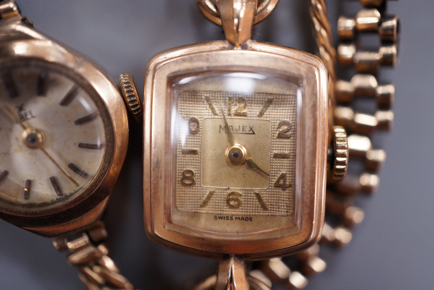 Two lady's 9ct gold manual wind wrist watches, Ebel & Majex, on 9ct bracelets, gross 25.6 grams and a lady's 9ct gold Regency manual wind wrist watch in a leather strap.